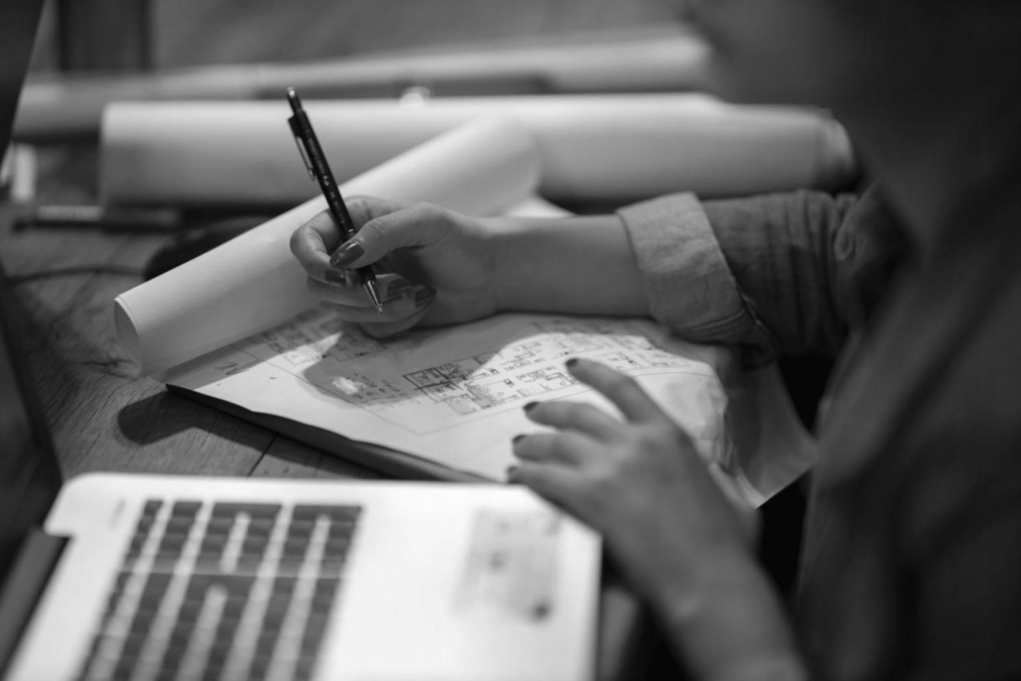 Investment planning workspace with charts and financial documents